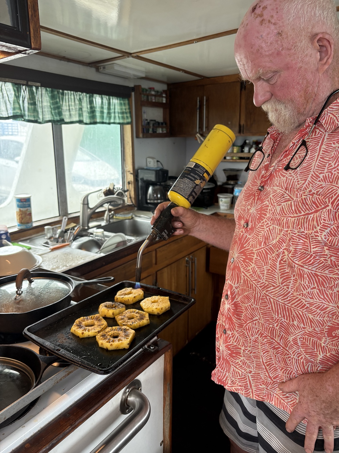Jeremy browning pineapple in Betty H's galley